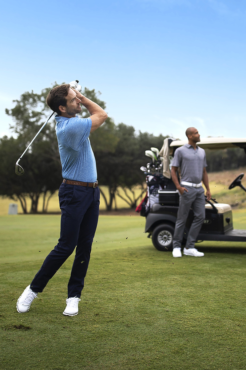 Friends playing golf