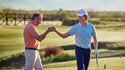 father and son golfing