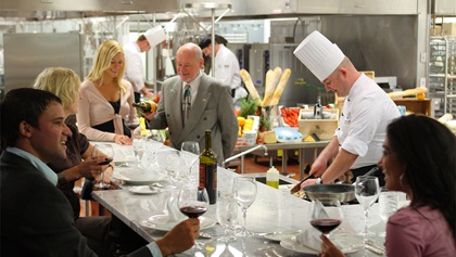 Restaurant seating with view of kitchen at 1796 Restaurant 